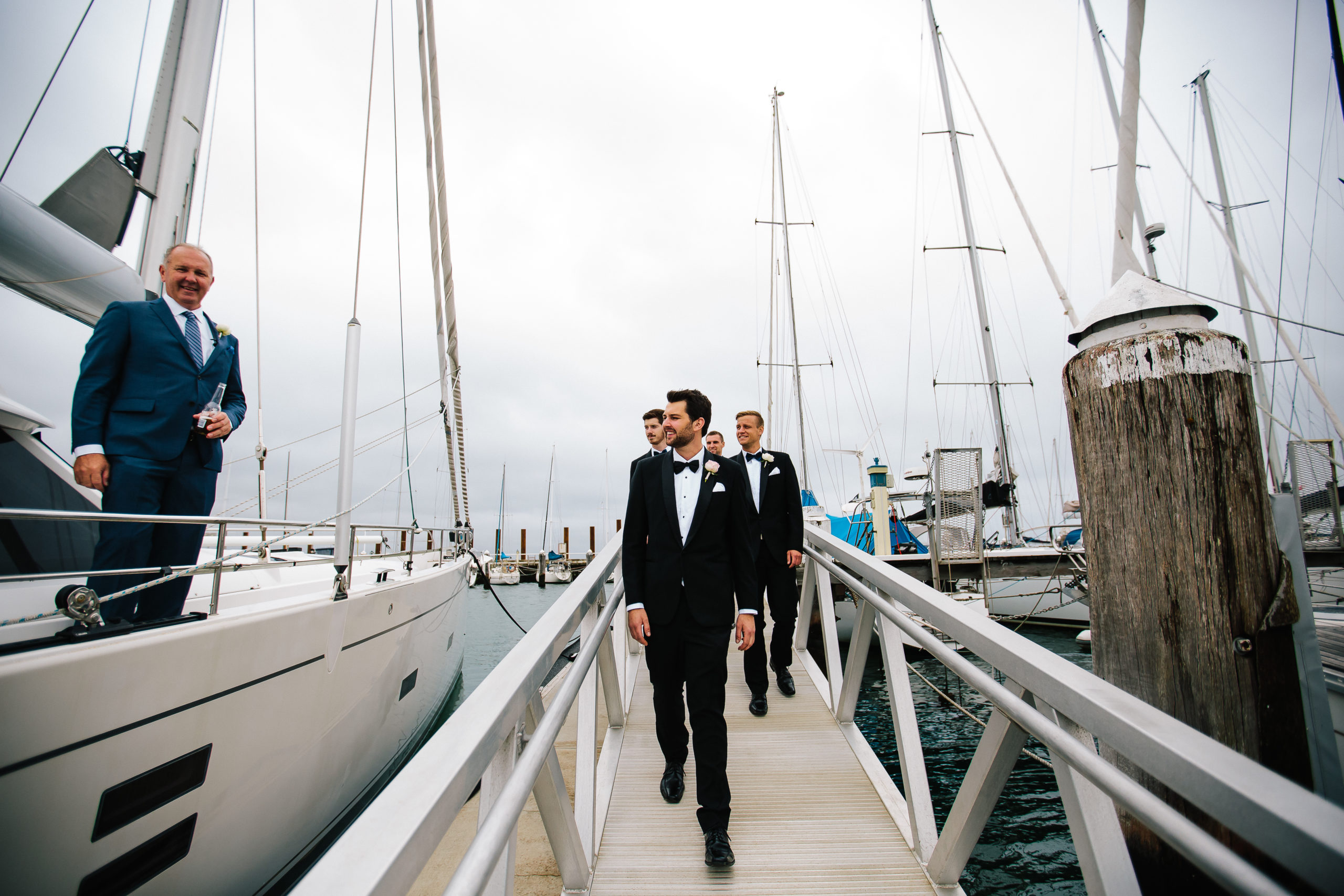 Groom and groomsmen in tuxedos